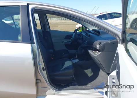 2013 Toyota Prius C Four z USA, uszkodzony, nr VIN JTDKDTB35D1053850